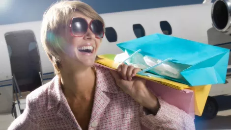 Happy shopping traveller