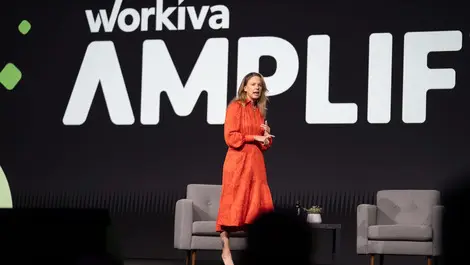 Penny ashley lawrence on stage   copyright workiva