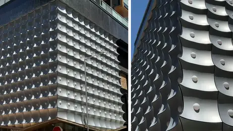 Self-cleaning exterior coating to support urban renewal